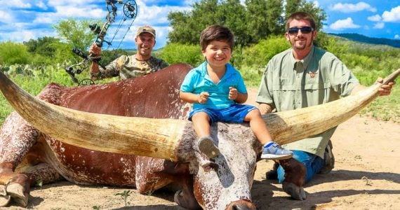 father son watusi hunting